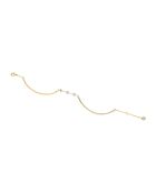 Maya Armband aus Goldmessing und Zirkonen