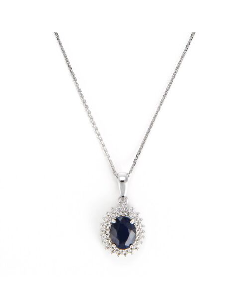 Ciondolo a forma di sole con zaffiro blu 1,5 ct e topazi bianchi 0,2 ct in oro bianco