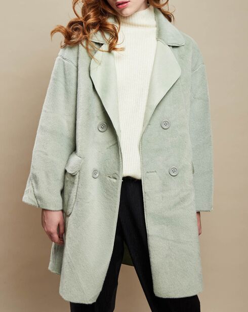 Groene jas met knopen van imitatiebont