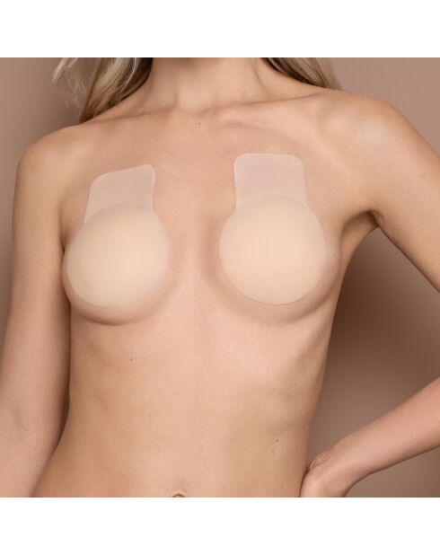 1 par de cubrepezones de silicona de color beige