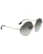 Lunettes de soleil Femme dorées