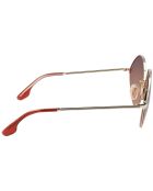 Lunettes de soleil Femme dorées