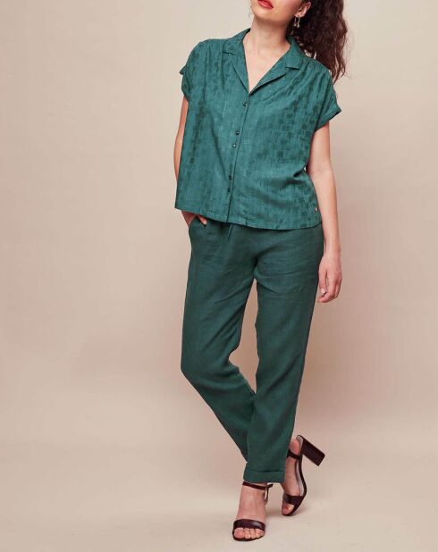 Dinais Bluse mit Pfauen-Palmenmuster
