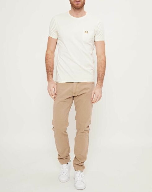 Camiseta color crudo con bolsillo