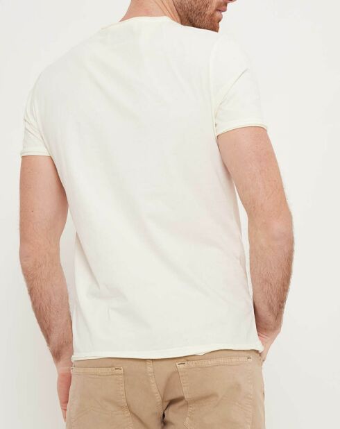 Camiseta color crudo con bolsillo
