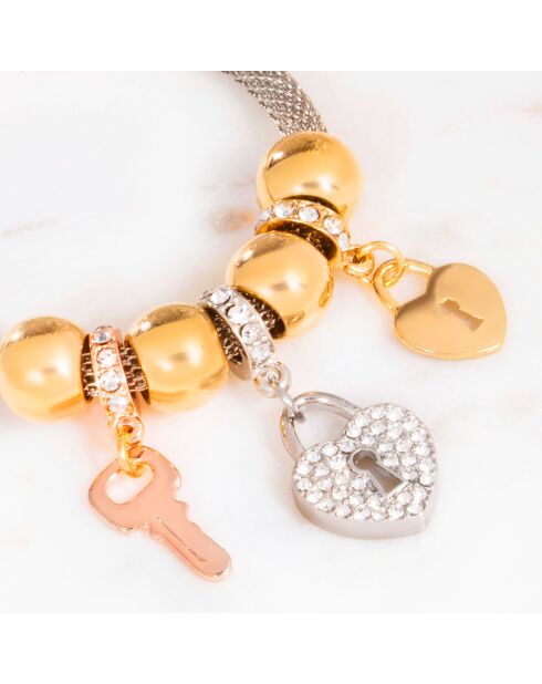 Brazalete con forma de corazón plateado, dorado y rosa