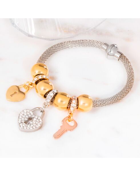 Brazalete con forma de corazón plateado, dorado y rosa