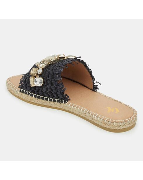 Platte muiltjes van gevlochten vezels met zwarte sieraden