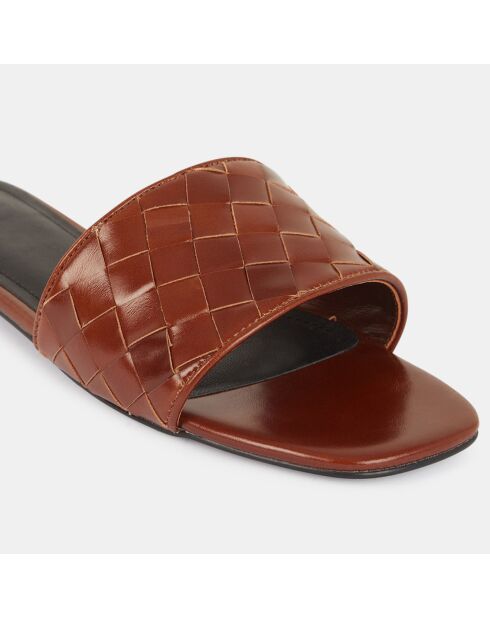 Platte leren muiltjes met bruine gevlochten band