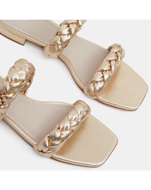 Sabot piatti in pelle con cinturini intrecciati dorati