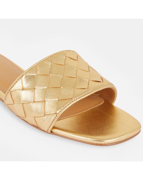 Mules plates en Cuir bride tressée dorées