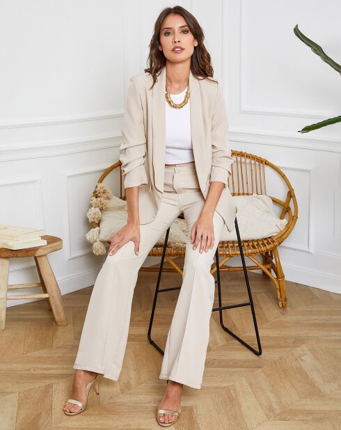 Beige jas Demence