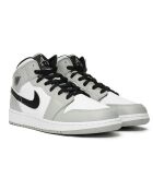 Baskets Jordan 1 Mid grises