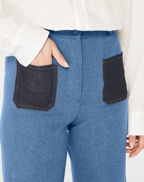 Rigoles blauwe spijkerbroek met uitlopende snit en patchwork