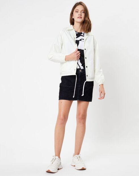 Schmale Damenjacke mit sehr hellgelbem Rückenmuster