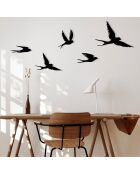 Decoración metálica con golondrinas negras