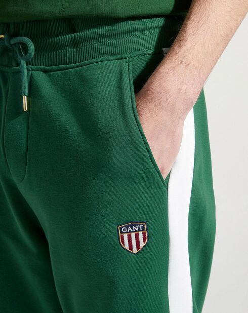 Jogging ajusté vert foncé/blanc