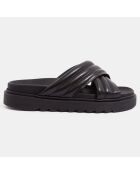 Mules plates en Cuir matelassées noires