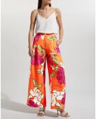 Orangefarbene Hose aus Leinen und Viskose mit schillerndem Blumenmuster