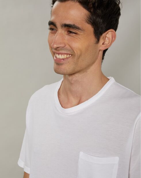 T-shirt bianca con tasca trapuntata