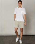 T-shirt bianca con tasca trapuntata