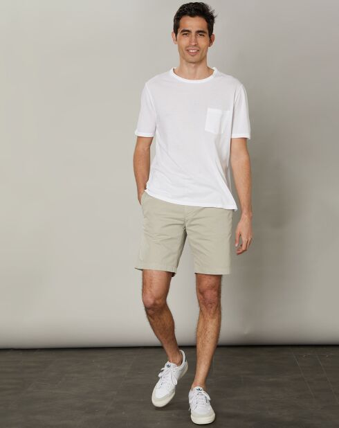 T-shirt bianca con tasca trapuntata