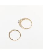 2 flamboyante sterringen diamanten 0,23 ct en witte topaas 0,17 kt geelgoud