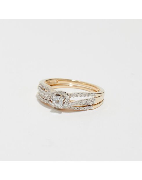 2 flamboyante sterringen diamanten 0,23 ct en witte topaas 0,17 kt geelgoud