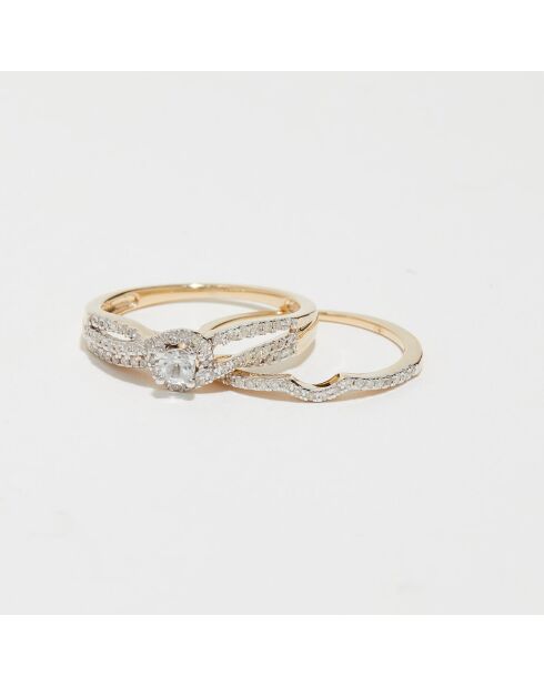 2 flamboyante sterringen diamanten 0,23 ct en witte topaas 0,17 kt geelgoud