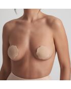 1 par de cubrepezones de tela beige