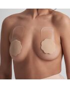 1 par de cubrepezones de silicona de color beige