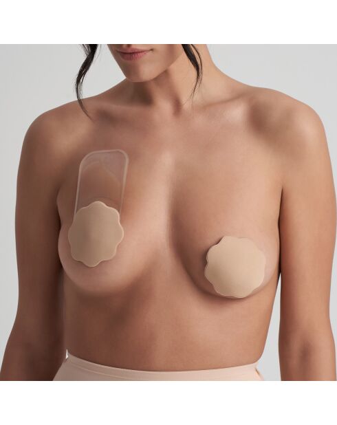 1 par de cubrepezones de silicona de color beige