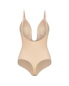 Body delgado que forma una tanga profunda de color beige