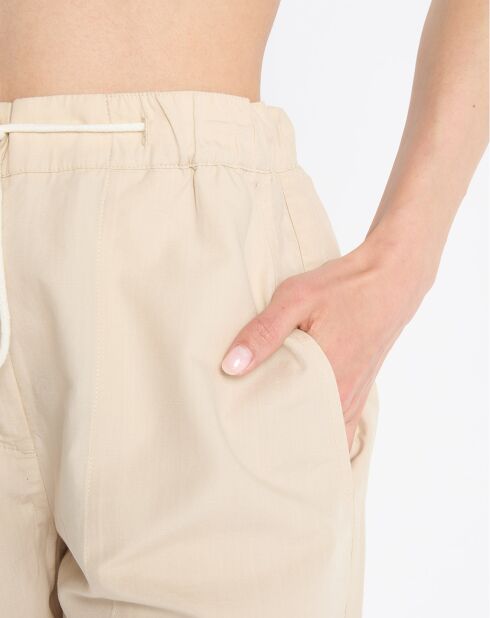Beige korte broek met elastische taille van katoen en linnen