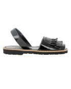 Sandalias negras de cuero universitario