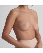 Beige niet-klevende tepelhoezen