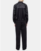Blouson bord cotes à Boutons Pressions et details Brodés noir