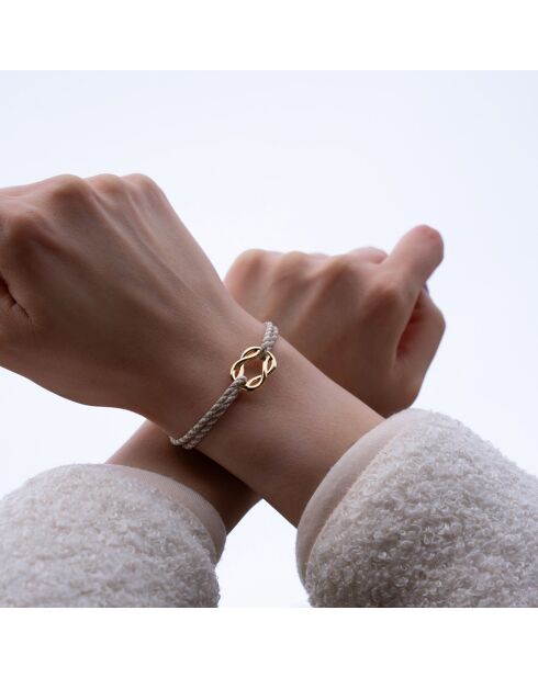 Pulsera con nudo Palomar bañada en oro blanco/beige