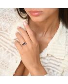 Anillo de oro blanco con diamante sauce de 0,048 quilates y zafiro de 0,38 quilates