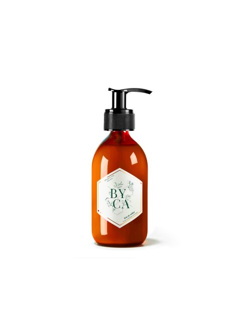 Bodylotion - glazen fles van 280 ml - geur van Kajander hout