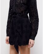 Jupe courte en broderie anglaise noire