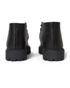Derbis negros con cordones altos