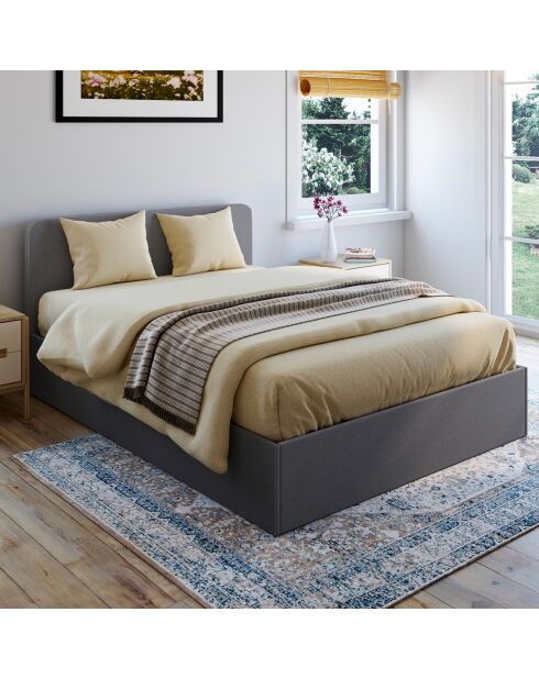 Lit coffre Louise en tissu gris avec sommier et tête de lit arrondie 140x190cm