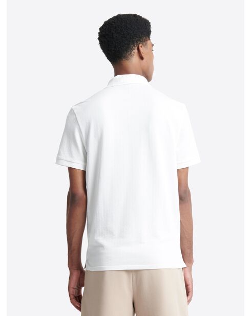 Polo manches courtes brodé en coton blanc neige