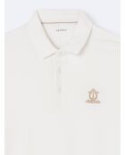 Polo manches courtes brodé en coton blanc neige