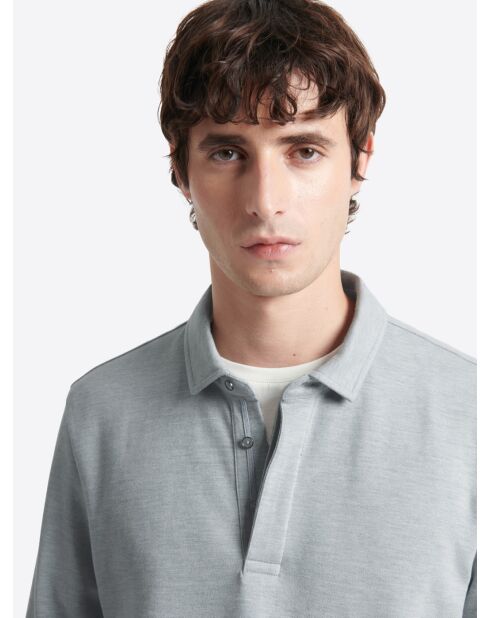 Polo manches longues chiné en Coton bleu zen