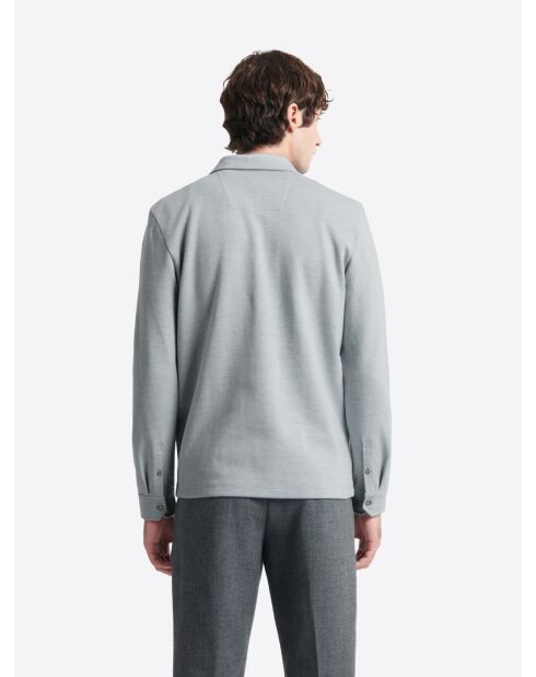 Polo manches longues chiné en Coton bleu zen