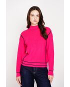 Pull col roulé montant fushia