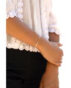 Pulsera con forma de rayo chapada en oro blanco