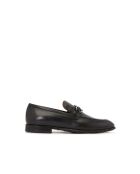 Mocassins Foster en cuir noirs